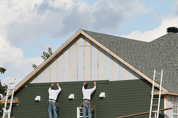 Professional Siding Replacement technician working in Armbrust, PA